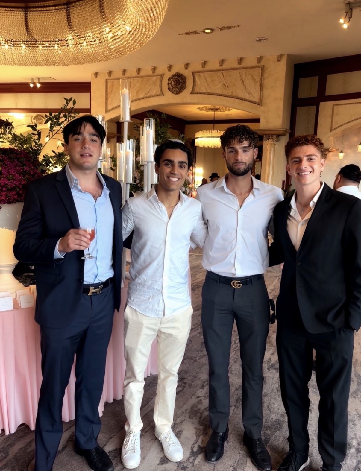 Sean dressed formally with three friends